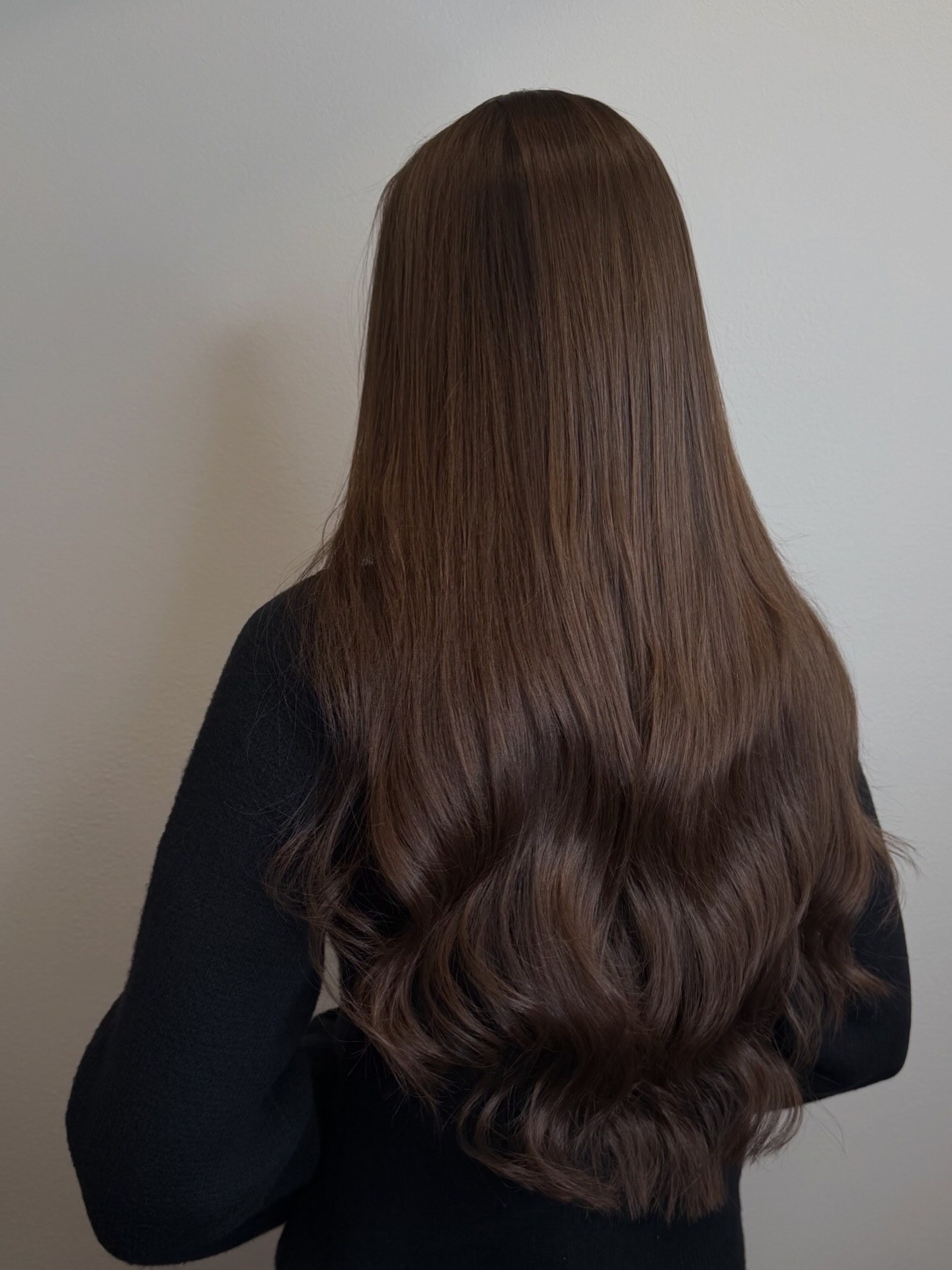 Long brunette Slavic hair extension result with soft movement